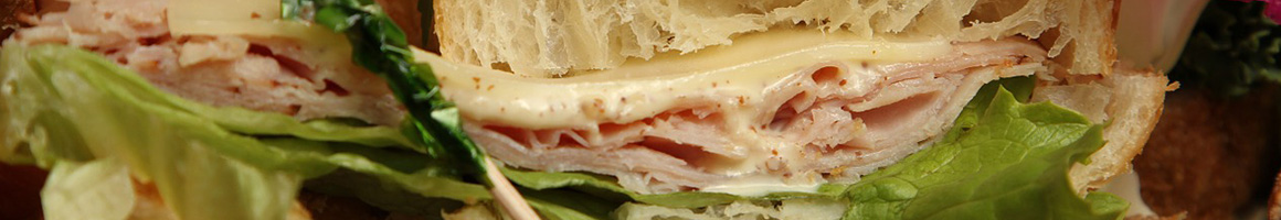 Eating Sandwich Chicken Salad at PDQ Brandon restaurant in Brandon, FL.
